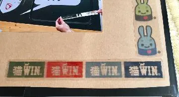 Blog post thumbnail for 緑さんの透明シール 「猫 WIN」「CUNE もどき」